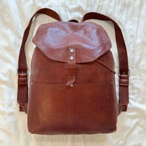 lucky brand oil tanned leather backpack with front pockets and reinforced straps